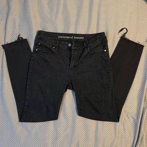 Distressed, muted black jeans